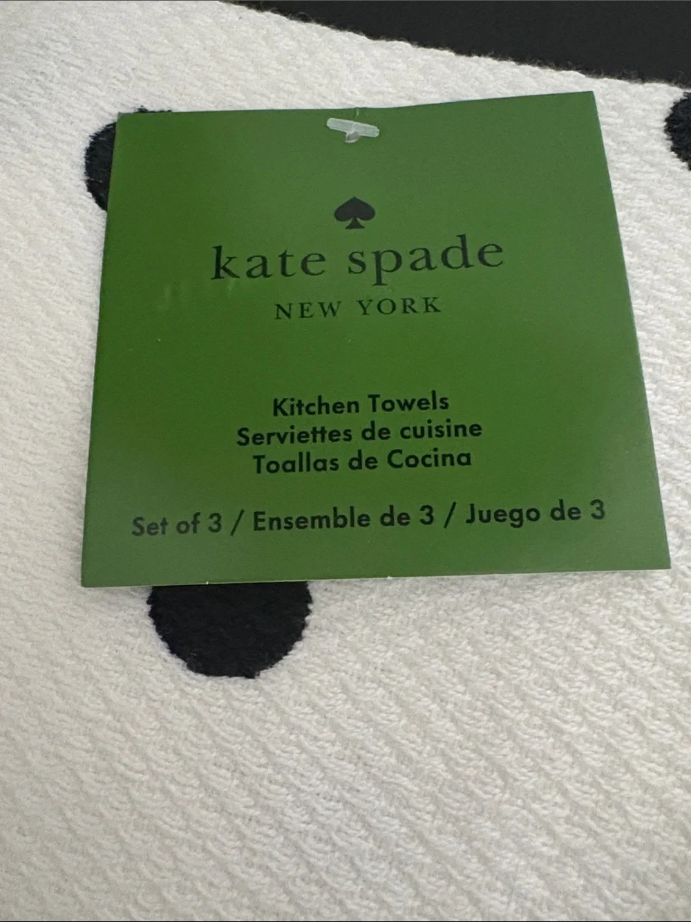 KATE SPADE Three black & white polka dot kitchen towels.